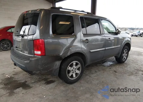 2010 Honda Pilot Touring z USA, uszkodzony, nr VIN 5FNYF4H99AB503539